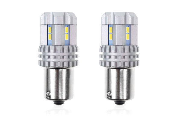 Set becuri auto cu LED CANBUS compatibil P21 R5W/R10W 22 SMD Alb 12V/24V, destinat competitiilor auto sau off-road