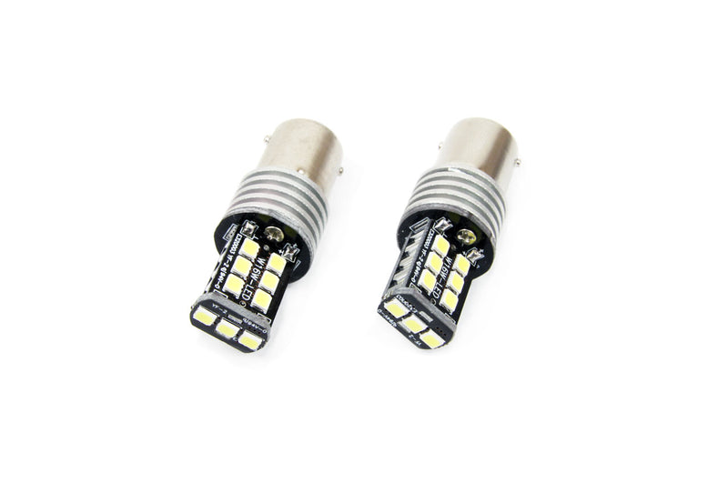 Set becuri auto cu LED CANBUS compatibil P21W BA15S 15 SMD 7.5W Alb 12/24V, destinat competitiilor auto sau off-road